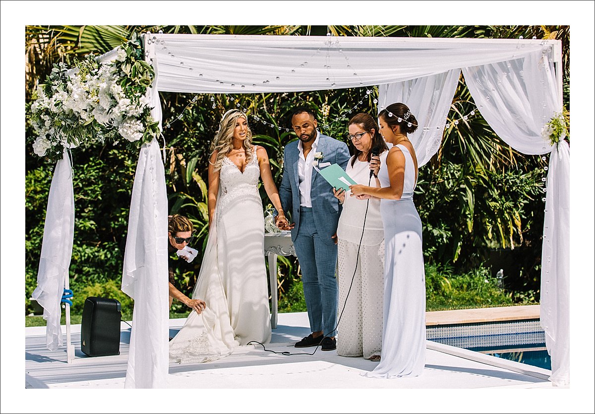 wedding ceremony over a pool in Finca La Concepcion in Marbella