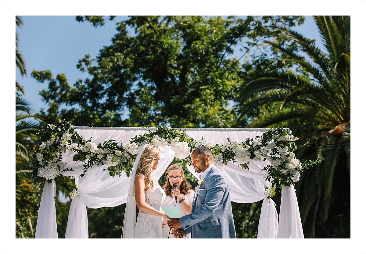 wedding ceremony over a pool in Finca La Concepcion in Marbella